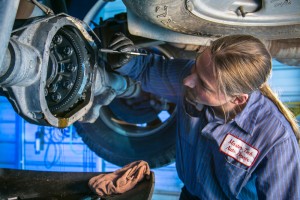 Jon working under a car